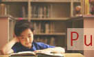 photo of child reading in library