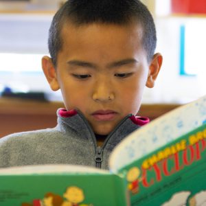 Photo of kid reading