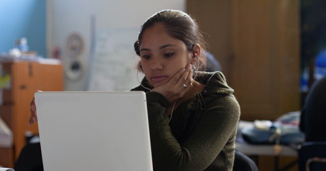 a student using a laptop
